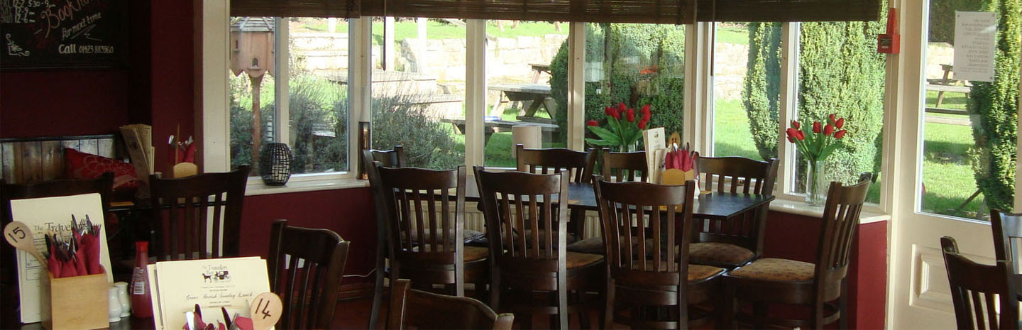 A plated pub meal served in a warm dining setting.